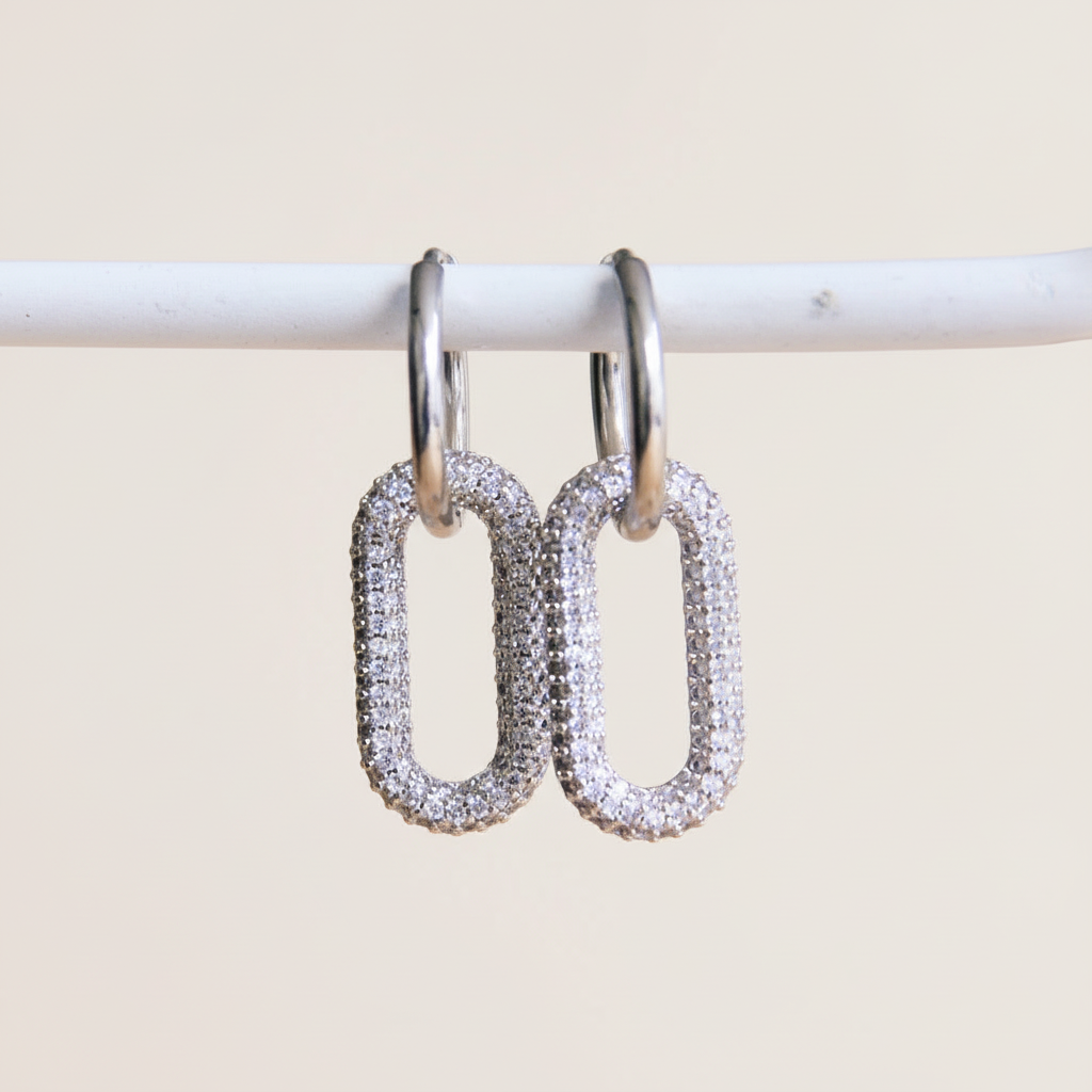 Lumina oorbellen zilver, roestvrijstalen ovale schakel oorbellen met glinsterende steentjes, dames sieraden