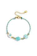 Armband met schildpad en schelp kralen en touwmotief