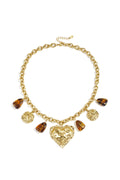 Schakelketting met hangende kralen munten en statement hart
