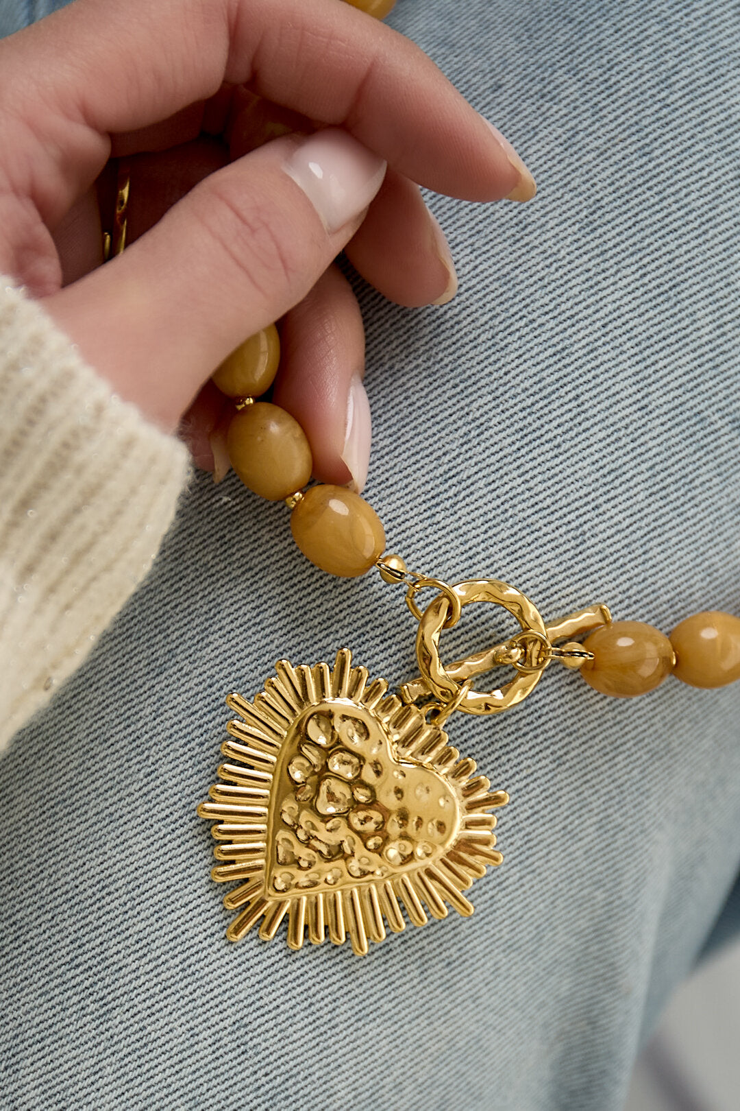 Kralenketting met frontsluitingcharm