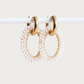 Gouden Pearl Loop oorbellen van stainless steel, versierd met kleine witte parels rond de ovalen hoepels