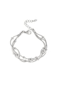 Armband met kettingen en polkadots
