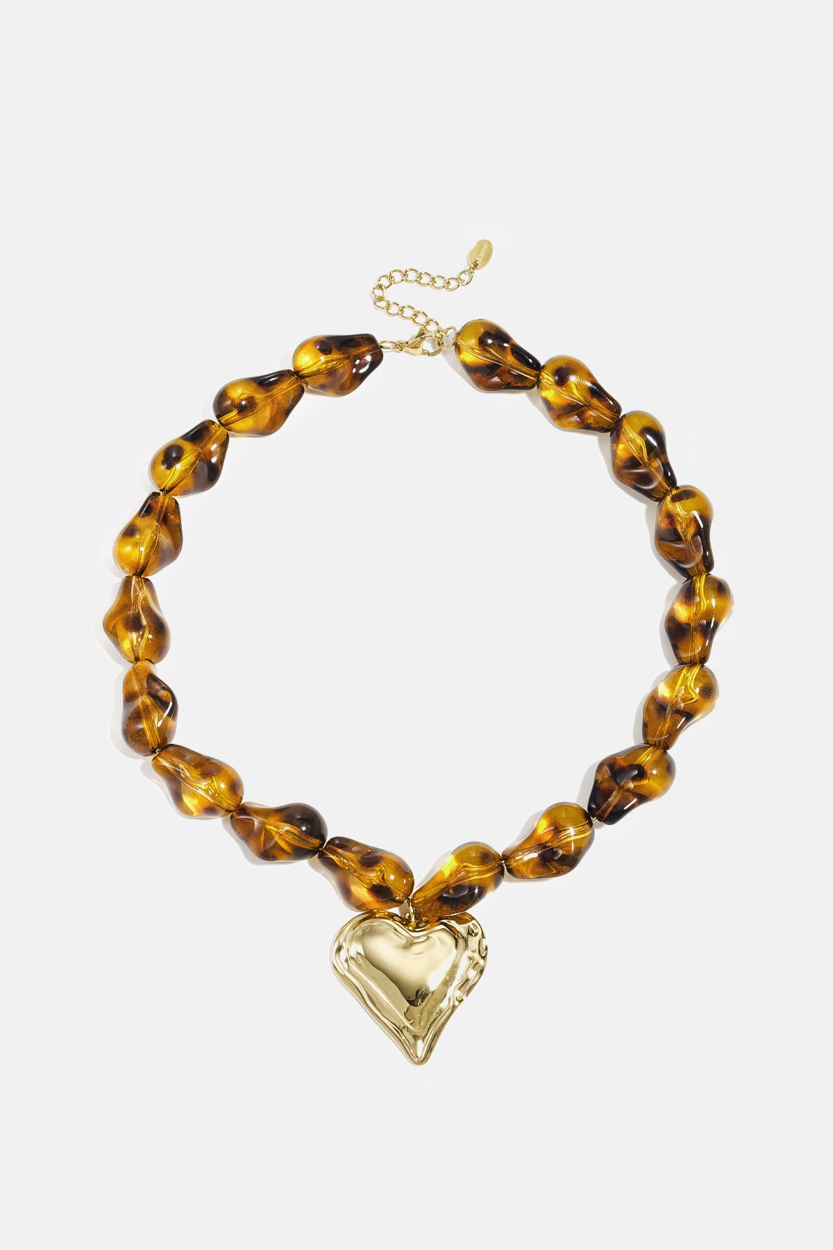 Kralenketting met natuurlijke vorm kralen en hangend hart