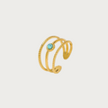 Gouden stainless steel ring met drie banden en een turquoise natuursteen in het midden, verstelbaar.