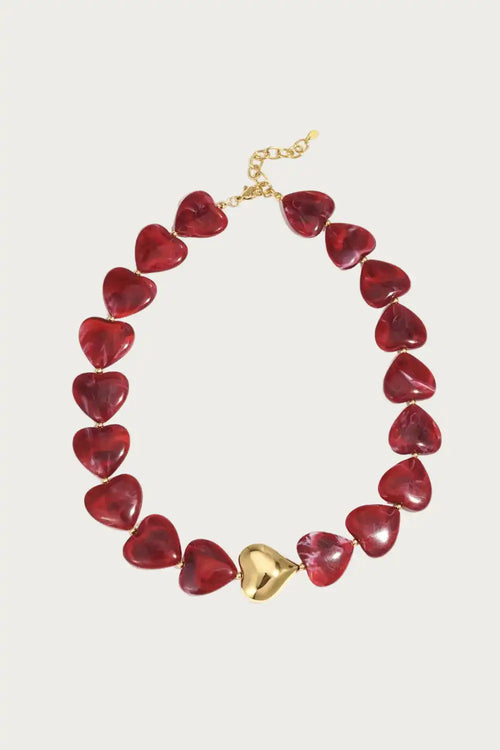 Rode hartjes ketting van roestvrij staal met een goudkleurig hartje, perfect voor dames sieraden