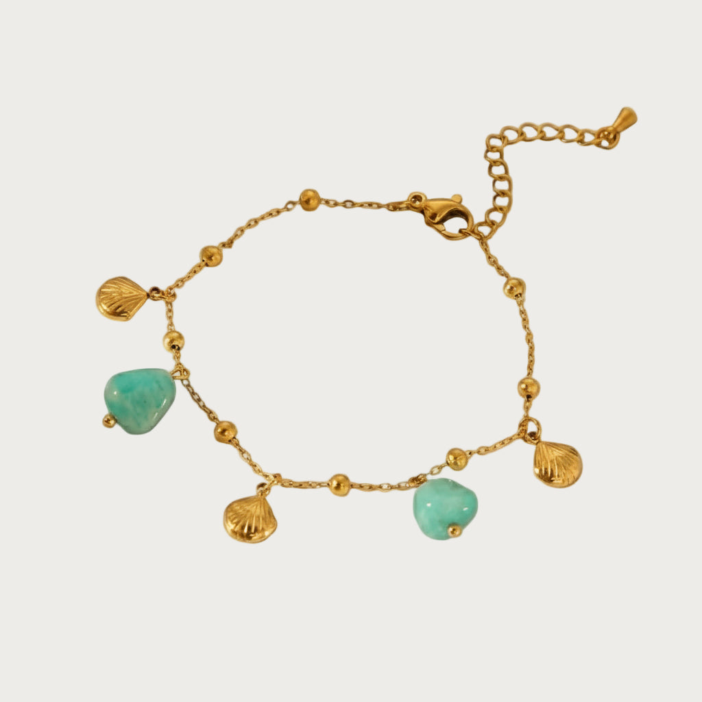 Gouden rvs armband met turkooisblauwe steentjes en schelpjes, waterdichte dames sieraden