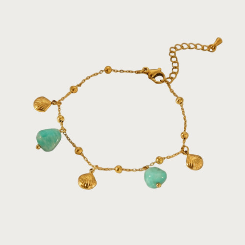 Gouden rvs armband met turkooisblauwe steentjes en schelpjes, waterdichte dames sieraden