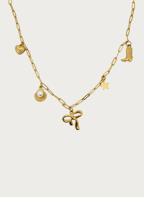 Gouden schakelketting met strikje, schelp, ster, hartje en cowboylaars bedels, van RVS