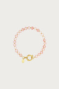 Clarisa armband van natuursteen met roze koraal kralen en gouden sluiting, luxe dames sieraad