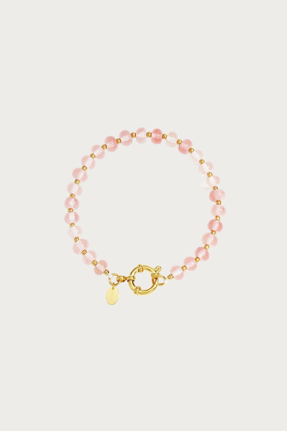 Clarisa armband van natuursteen met roze koraal kralen en gouden sluiting, luxe dames sieraad