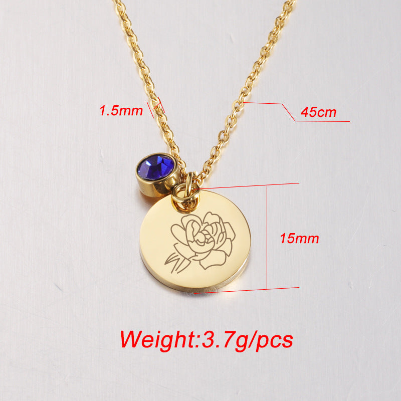 Gouden geboortesteen ketting met blauwe steen en ronde hanger met verjaardagsbloem gravering