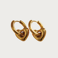 Gouden hartjes oorbellen van stainless steel, kleine glanzende dames oorringen in hart vorm