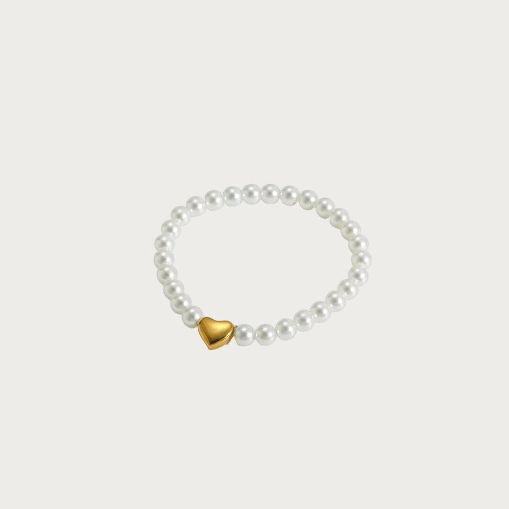 Witte parel armband met gouden hartje, stainless steel hartjes armband, dames sieraden