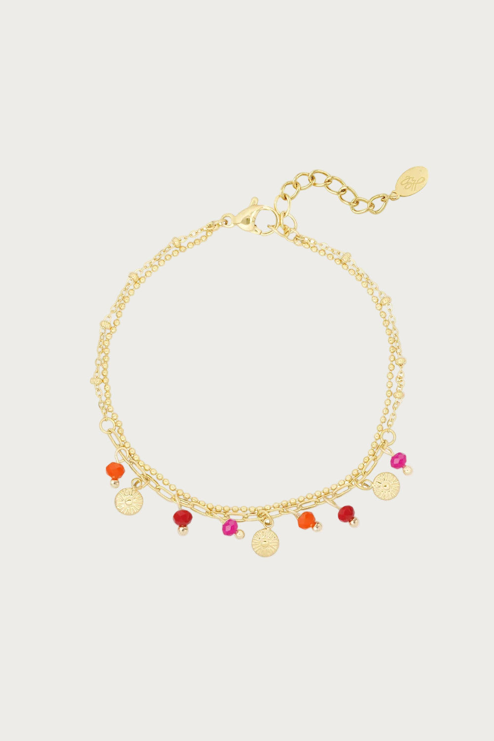 Gouden Ilana armband van stainless steel met oranje en roze kralen en zonbedeltjes, verstelbaar in lengte.