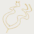 Gouden dubbele ketting van roestvrij staal met bar-hanger en glimmende zirkonia, een elegant sieraad voor dames.