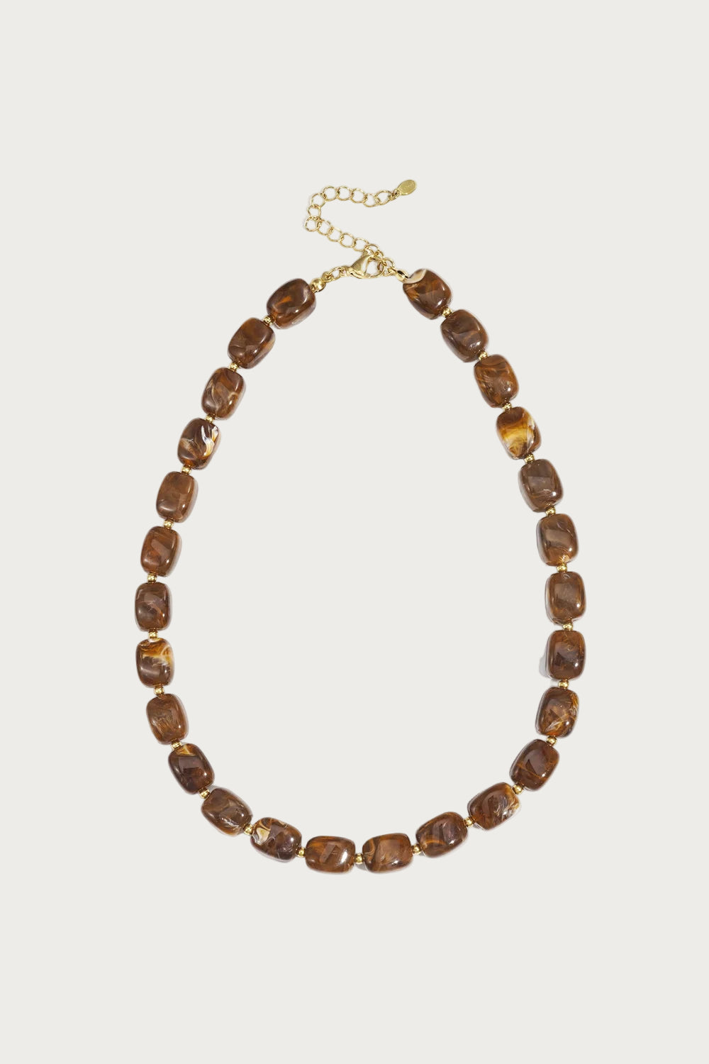 Mara schakelketting van chocoladekleurige kralen van roestvrij staal, met goudkleurige sluiting, voor dames