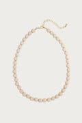 Mira beige kralenketting van roestvrij staal met gouden sluiting, modern damesjuweel