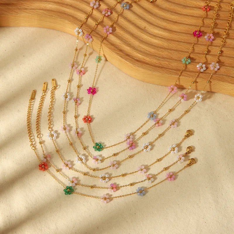 Miranda ketting van roestvrij staal in lightpink, met kleurrijke bloemetjes en kralen, dames sieraad