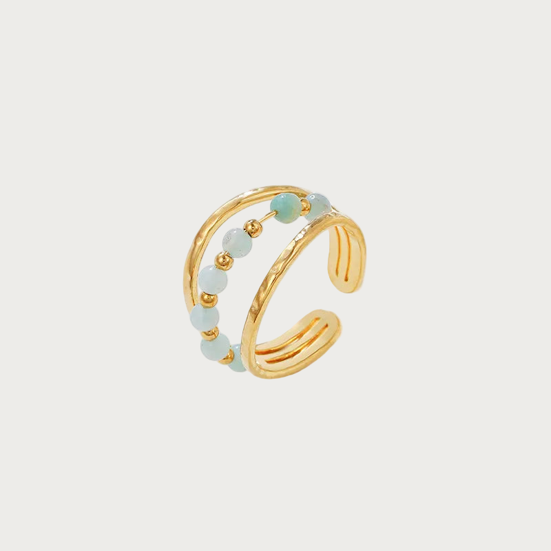 Misty ring van roestvrij staal, goudkleurig, met lichtblauwe en gouden kraaltjes, verstelbare dames sieraden.
