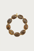 Sienna - Kralen armband - Brown - Stainless Steel met glanzende bruine kralen en goudkleurige accenten, ideaal voor dagelijks gebruik.