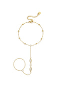 Handchain met druppelvormige statement stenen