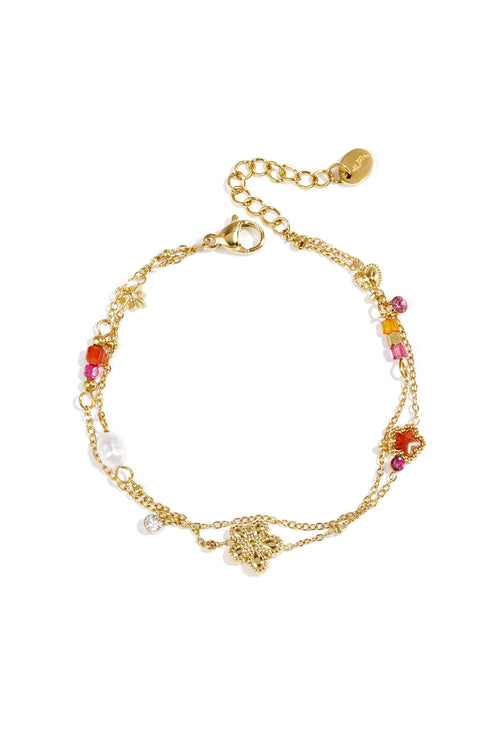 Bedelarmband met ster en bloemcharms, parels, steentjes en kraaltjes