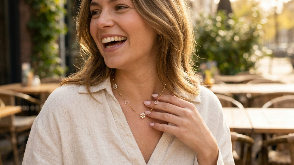 Stainless steel Miranda necklace in light pink, stylish and durable, perfect for everyday wear, close-up in use