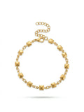 Sleek Nola stainless steel bracelet with a polished finish, perfect for everyday wear and layering, on a white background