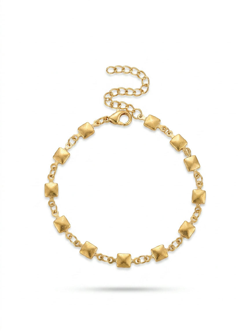 Sleek Nola stainless steel bracelet with a polished finish, perfect for everyday wear and layering, on a white background