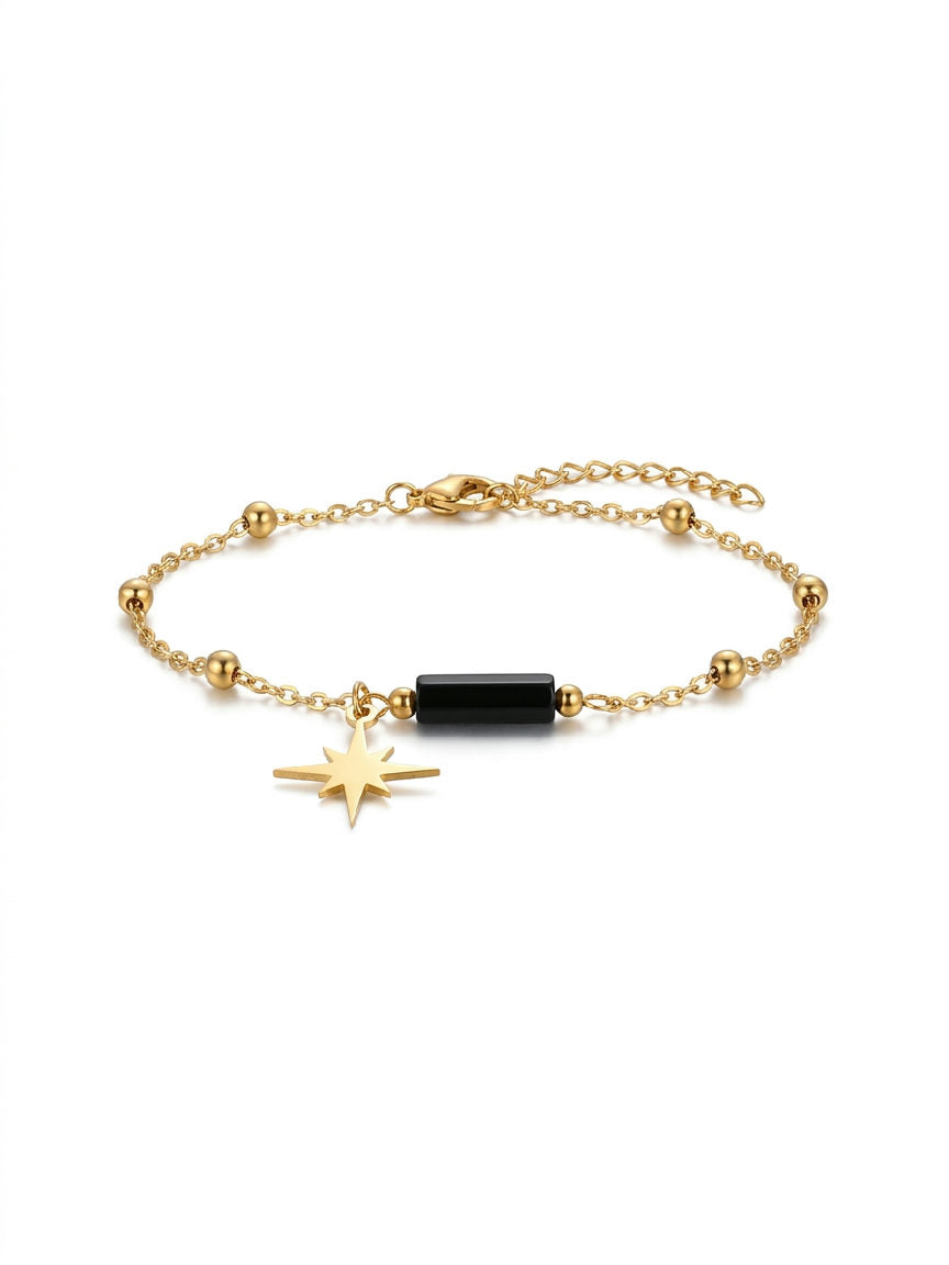 Shimmering silver stainless steel bracelet featuring a delicate chain and a small, polished charm