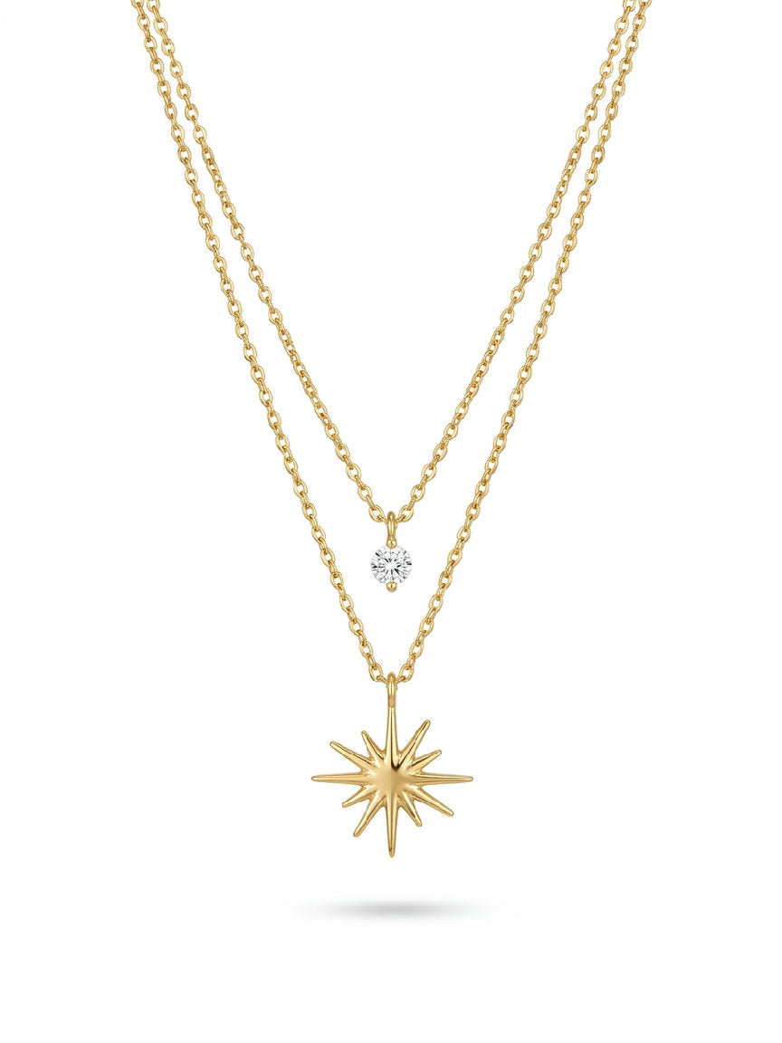 Gouden dubbele ketting van stainless steel met glimmende zirkonia en sterbedel, elegante dames sieraden