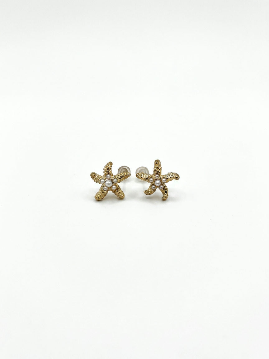 Elegante oorbellen met sterren en parels, gemaakt van een glanzende zilverkleurige legering, perfect voor elke gelegenheid